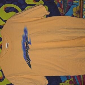 Supreme Tee in Coral Orange with Blue Accents